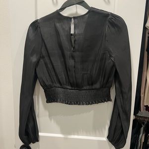 Really cute black top! Size small, never worn!